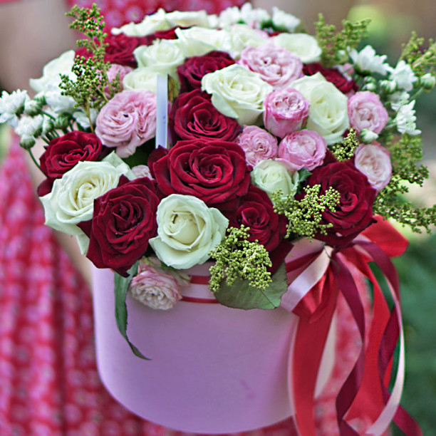 Colorful bouquet in a hat box buy with delivery